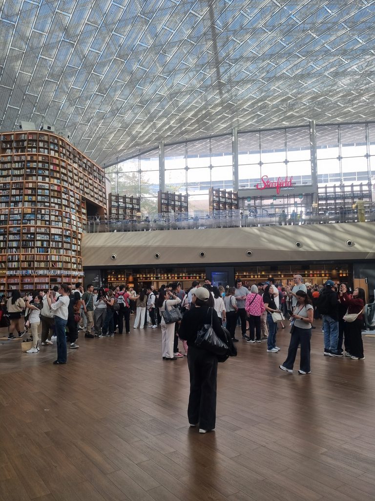 Starfield Library at COEX Mall Seoul, featuring towering curved bookshelves and an open reading area
