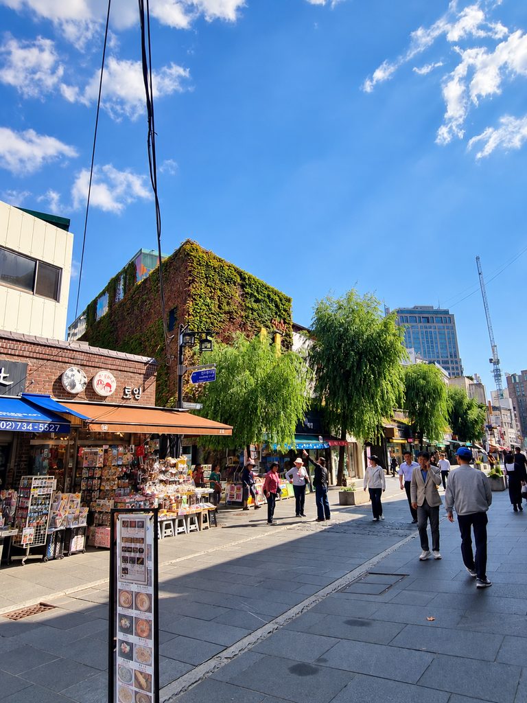 Where to Stay in Seoul: Best Areas for First-Time Visitors Tree-lined pedestrian street in Insadong Seoul