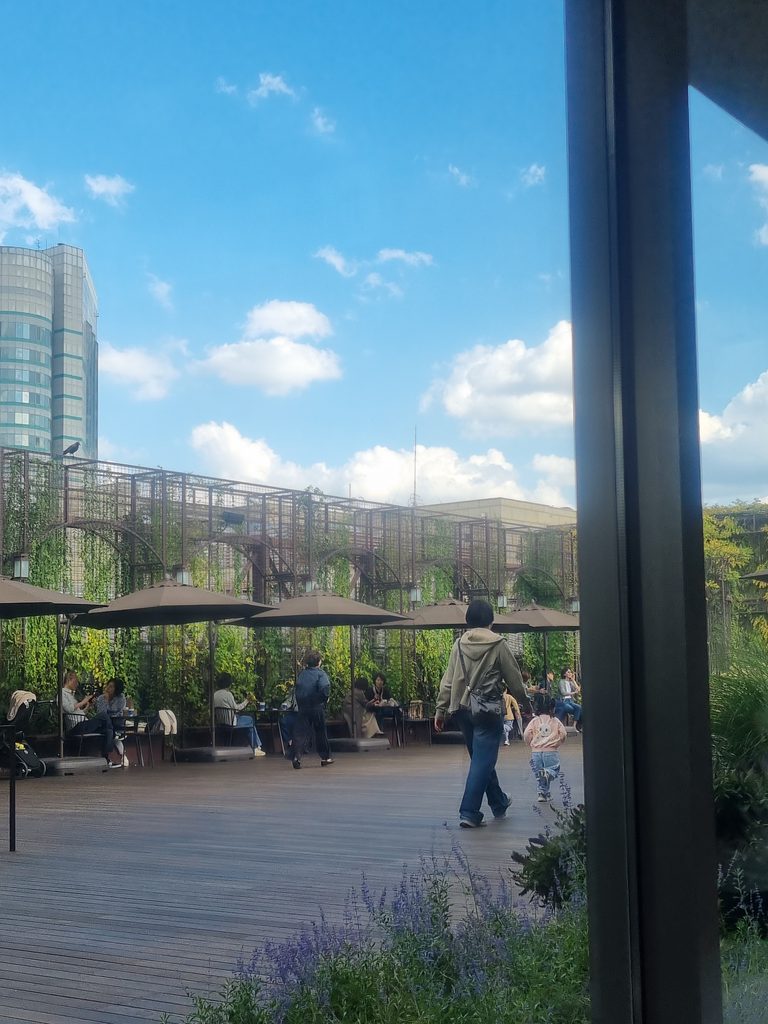 Outdoor garden with seating at Hyundai Department Store Trade Center in Seoul